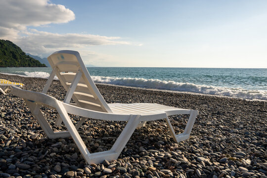 Beach with sun loungers sea view