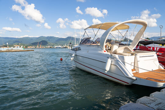 A motor yacht moored at the pier