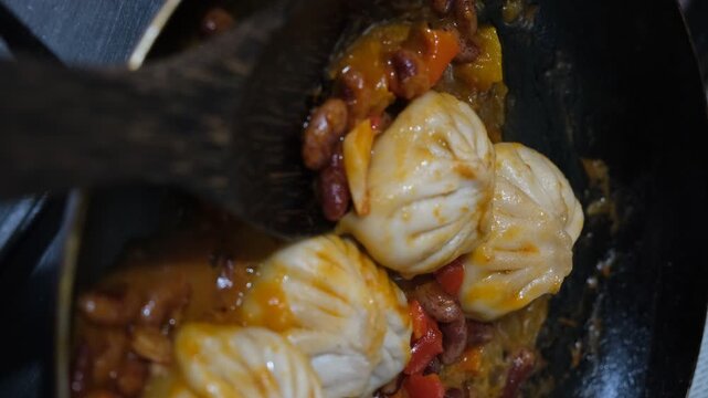 Bean and vegetable ragout paired with dumplings, bold twist on traditional flavors. Recipe combines a rich, ragout of beans, vegetables, dumplings, offering a unique fusion, It&rsquo;s not your typical dish