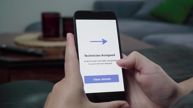 User checks a Technician Assigned confirmation message and hovers over the View details option on a home service app.
