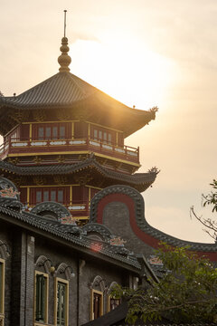 Pagoda Pantjoran Chinatown PIK is silhouetted against the sunlight