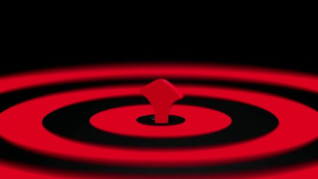 Red arrow centered on concentric target rings against a high contrast black background