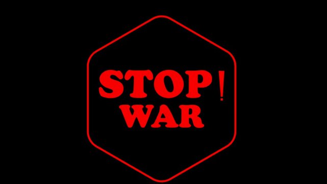 Stop war sign with bold red text on black surface for peace and protest movement