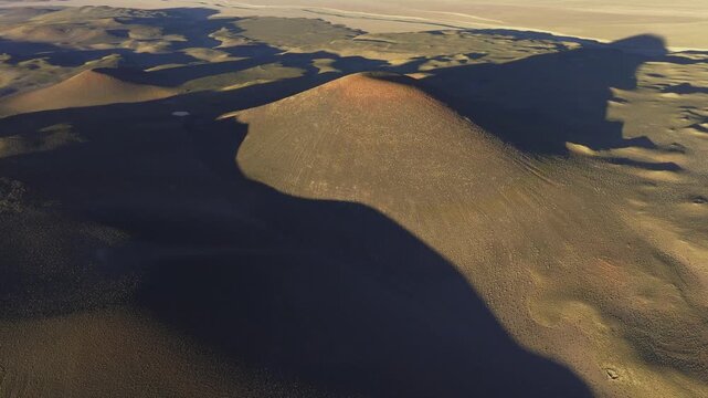 Aerial volcanic cones and shadows in La Puna desert