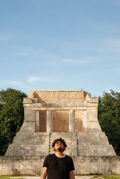 young person at the archaeological zone of Chichen Itza, Yucatan, Mexico