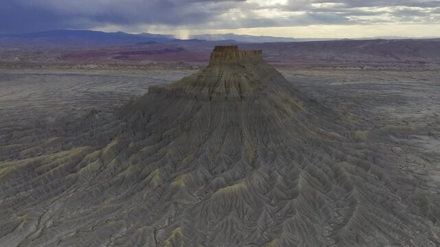 Aerial view of Factory Butte sandstone badlands in Utah