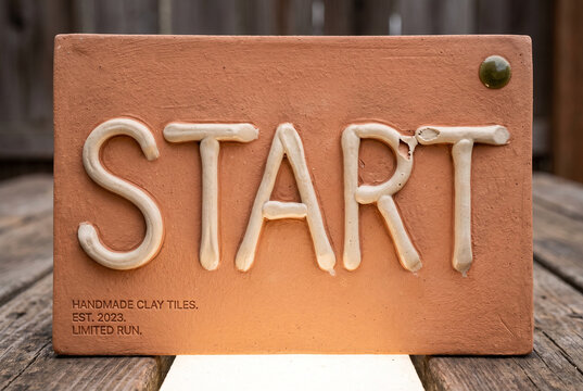 Handmade clay start sign with ceramic lettering