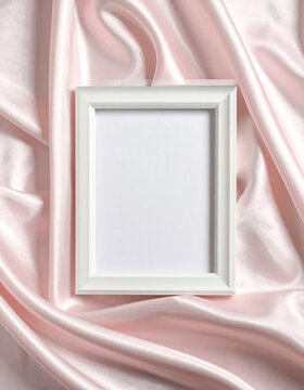 White frame on pink fabric