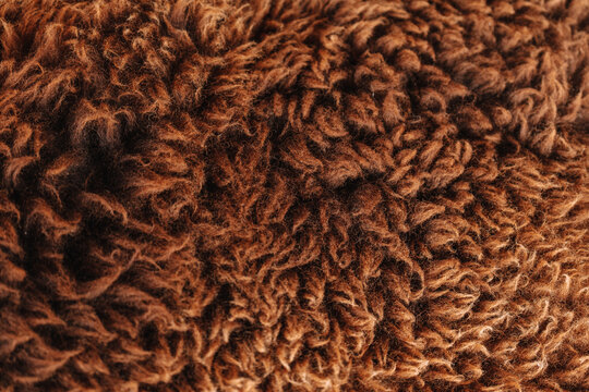 Fur Fibers and Plush Textile.Brown Wool Fabric for winter backgrounds, cozy home decor, textile advertising, seasonal banners and hygge designs