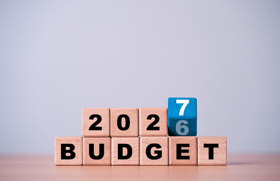 2027 budget planning concept with wooden blocks changing from 2026 to 202 representing annual financial planning, business budgeting, fiscal strategy, expenses and future money management.
