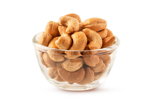 Roasted Cashew Nuts in Glass Bowl Isolated on Whit background.perfect for healthy snack branding and food packaging design.