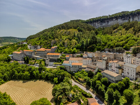 Aerial view of Roquefort-sur-Soulzon village in southern France, production of Roquefort French blue cheese made from sheep's milk, aged in natural Combalou caves