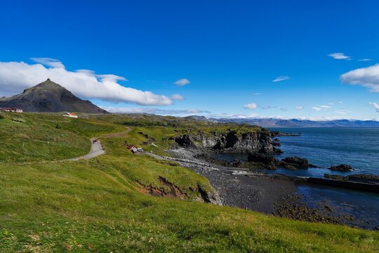 Cliff coastline between the villages of Hellnar and Arnarstapi in western Iceland.