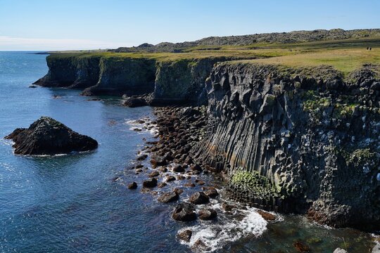 Cliff coastline between the villages of Hellnar and Arnarstapi in western Iceland.