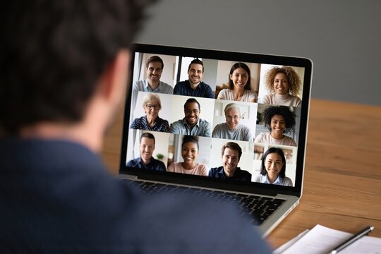 Meeting of remote team on laptop screen for virtual business video conference call