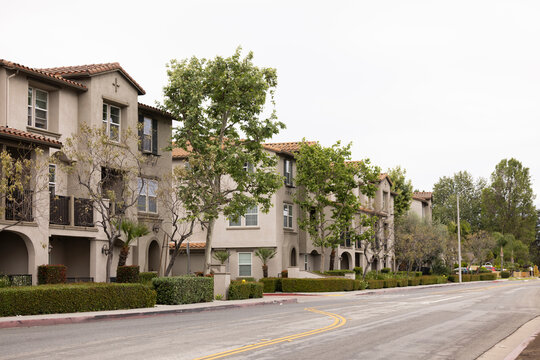 Overcast stormy sky over apartment homes in Montebello, California, USA.