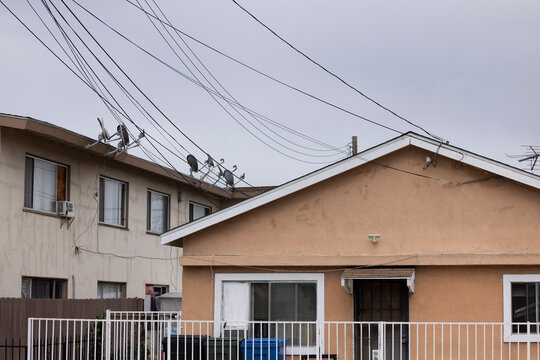 Overcast stormy sky over apartment homes in Montebello, California, USA.