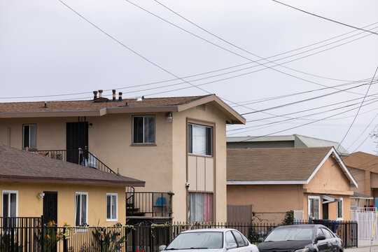 Overcast stormy sky over apartment homes in Montebello, California, USA.