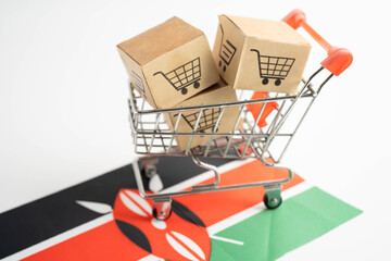 Online shopping, Shopping cart box on Sudan flag, import export, finance commerce. © Pakawadee