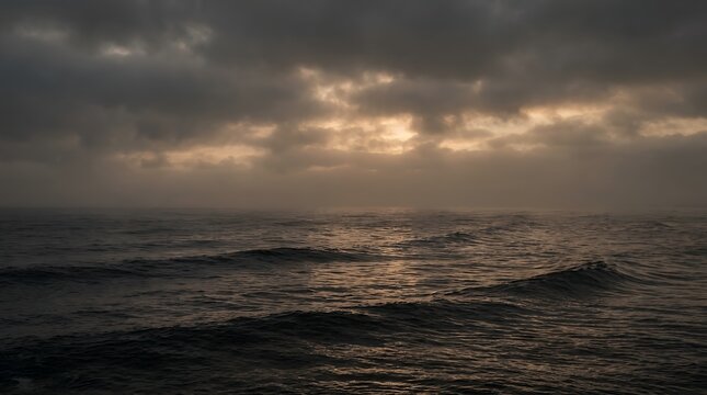 Rolling marine swells beneath an overcast atmosphere tranquil sea scenery illuminated in warm metallic gradients aerial afternoon atmosphere bay beach beautiful breeze calm clear cloud clouds cloudy