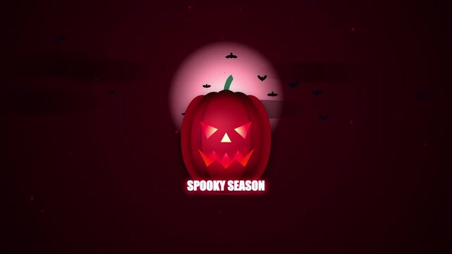 Spooky Halloween pumpkin with glowing face and bats