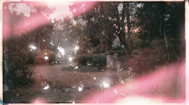Retro Analogue Film Exposure Overlay Exhibiting Soft Pink Light Leaks And White Flares To Create A Distressed Vintage Aesthetic On Photographs light leak film vintage texture overlay photo effect