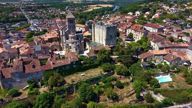 High angle drone advances toward Chauvigny castle and church in France