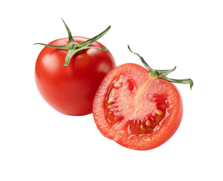 Tomatoes placed on a white background and cut tomatoes