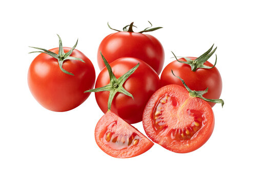 Tomatoes placed on a white background and cut tomatoes