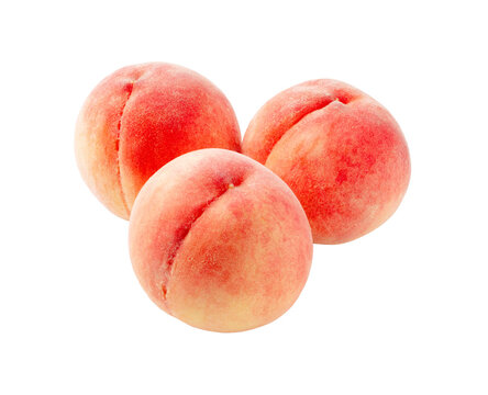 Peaches placed on a white background.