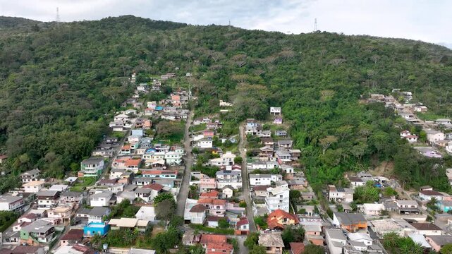 Florian&oacute;polis, Costeira do Pirajuba&eacute; Neighborhood and Beira-Mar Sul Between Hills and Mangroves, Santa Catarina, Brazil. Aerial View. Establishing Shot.