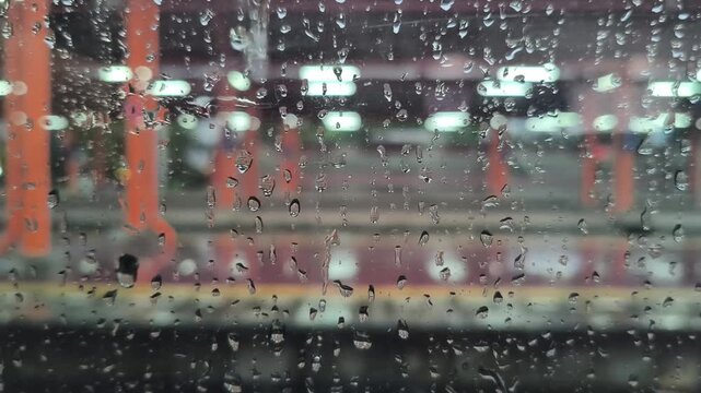 Raindrops on Train Window Glass Looking at Motion Blur of Moving Railway Carriage