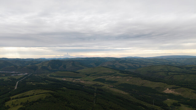 Aerial panoramic view of Huanggangliang National Forest Park in Chifeng, Inner Mongolia. Vast forest mountain natural landscape, dense woods, mountainous terrain and magnificent northern forest scener