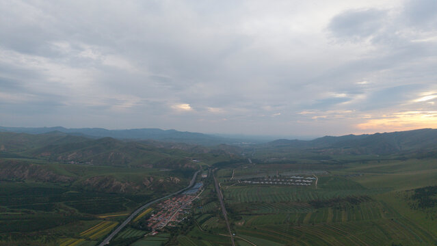 Aerial panoramic view of Huanggangliang National Forest Park in Chifeng, Inner Mongolia. Vast forest mountain natural landscape, dense woods, mountainous terrain and magnificent northern forest scener