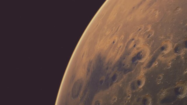A view of Mars from space shows its surface with different textures and colors. The image highlights mountains and valleys under the sunlight. This scene is from an outer space perspective.