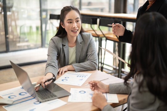 Business meeting with women discussing reports, strategy and project decisions