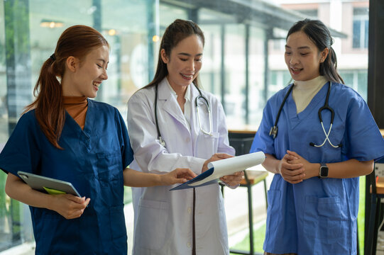 Healthcare professionals collaborating on medical information and patient care using technology