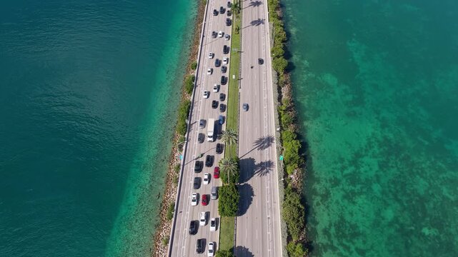 MIami, FL, USA - July 24, 2025: Car traffic road highway. Urban traffic. Road way with car. Cars on causeway road. Urban roadway. MacArthur Causeway. Roadway Downtown Miami to Miami Beach.