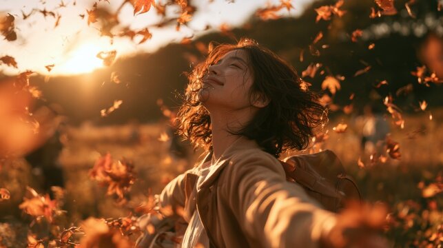 Happy Young woman,playing and lying on green grass,falling maple leaves,Colorful autumn Park,red and yellow maple trees,blue sky,forest path,Lawn in city park,yellow leaves in park,Natural Wallpaper.