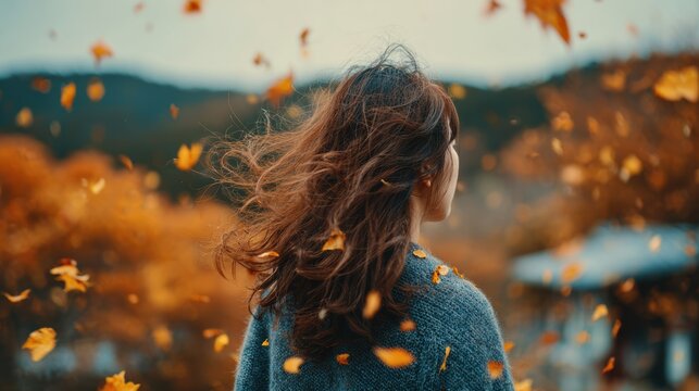 Happy Young woman,playing and lying on green grass,falling maple leaves,Colorful autumn Park,red and yellow maple trees,blue sky,forest path,Lawn in city park,yellow leaves in park,Natural Wallpaper.