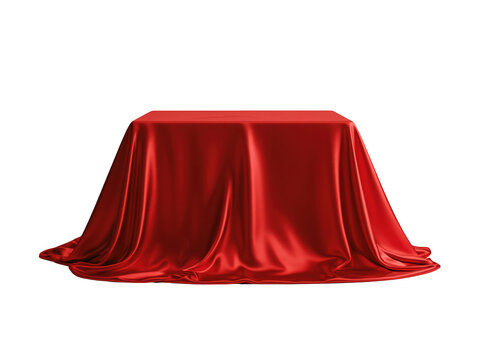 Red silk fabric covering a square pedestal for product display or luxury presentation.