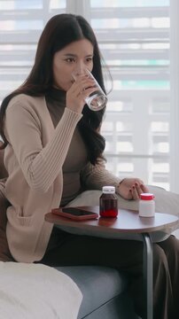 woman take or eat medical pill for treatment healthcare