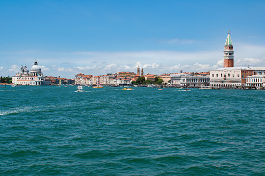 Venice skyline from the water featuring St Mark's Campanile and Doge's Palace