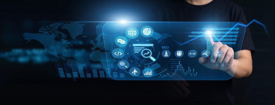 Digital marketer using modern interface for advanced SEO optimization. Specialist tracking keyword rankings, analyzing organic web traffic, and auditing backlinks on a live digital dashboard.