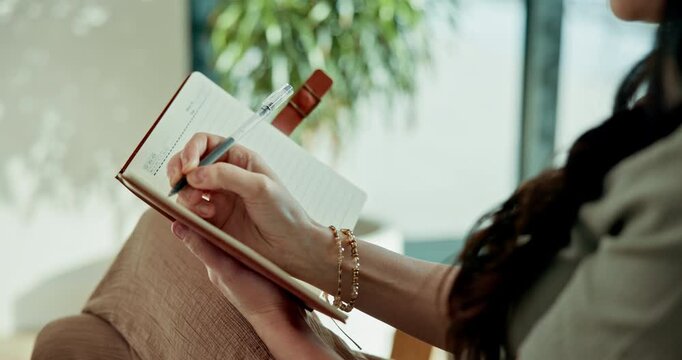 Woman, writing and hands with journal in house, creative and planning for goals with info and ideas. Journaling, notes and person with notebook, brainstorming and schedule agenda with diary in home