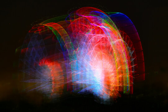 Colorful Abstract Light Trails on Black Background