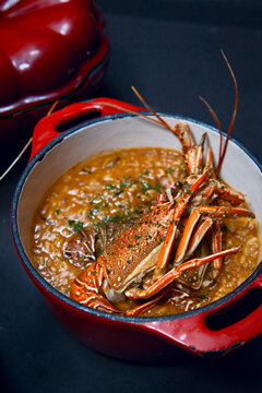 Cooked Lobster in Red Pot with Seafood Sauce