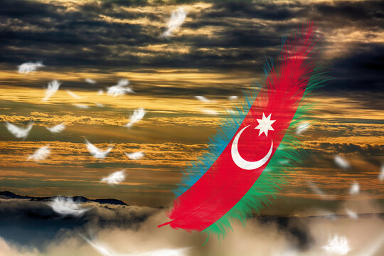 3D illustration. Flag of Azerbaijan on a feathers fluttering in the sky background.