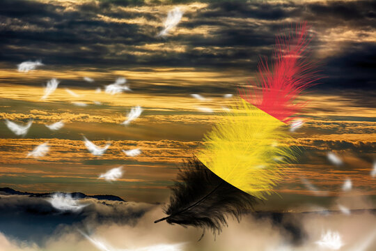 3D illustration. Flag of Belgium on a feathers fluttering in the sky background.