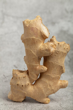 Fresh Ginger Root on Gray Background